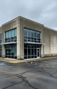 Commercial building exterior before professional cleaning in Texoma