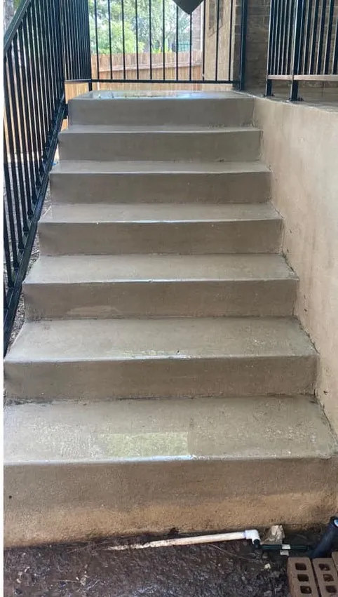 Clean concrete patio after professional cleaning